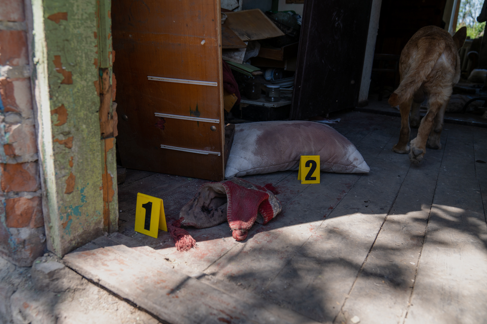 Investigators placed evidence markers next to relevant evidence, in this case blood stains.