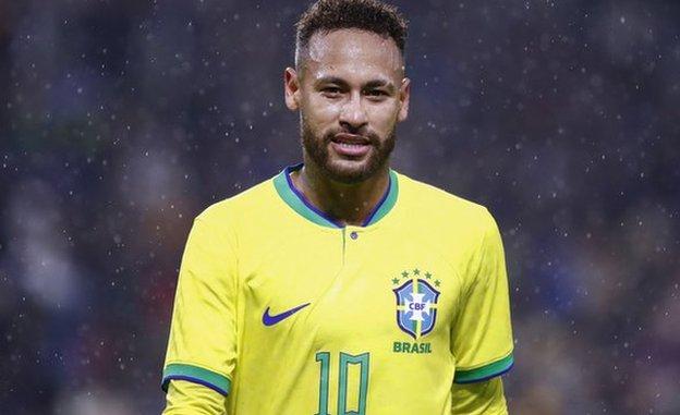 Neymar wearing the yellow Brazil home shirt, number 10