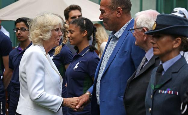 Queen Camilla, then the Duchess of Cornwall, meets Winston Norton on a visit to Wimbledon in 2016