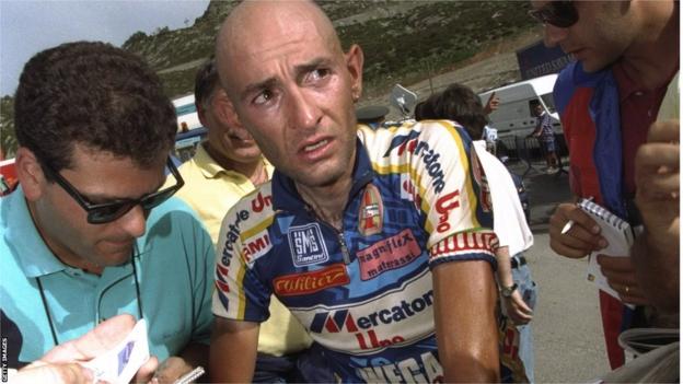 Marco Pantani is surrounded by reporters after stage 10 of the 1998 Tour de France