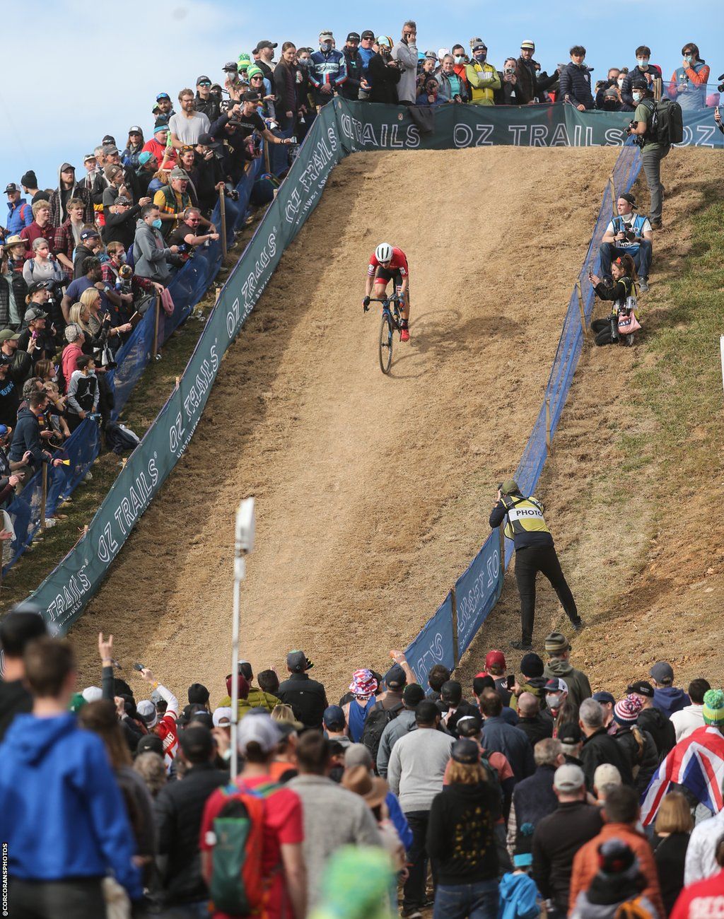Felipe Nystrom descends a slope while competing at a cyclocross event