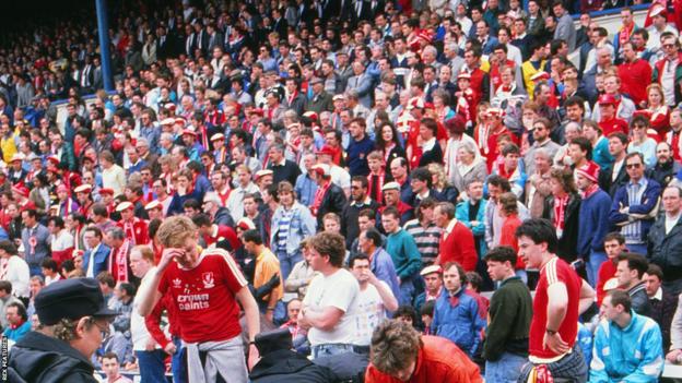 Nottingham Forest fans watch on at the opposite end to Leppings Lane at the 1989 FA Cup semi-final at Hillsborough
